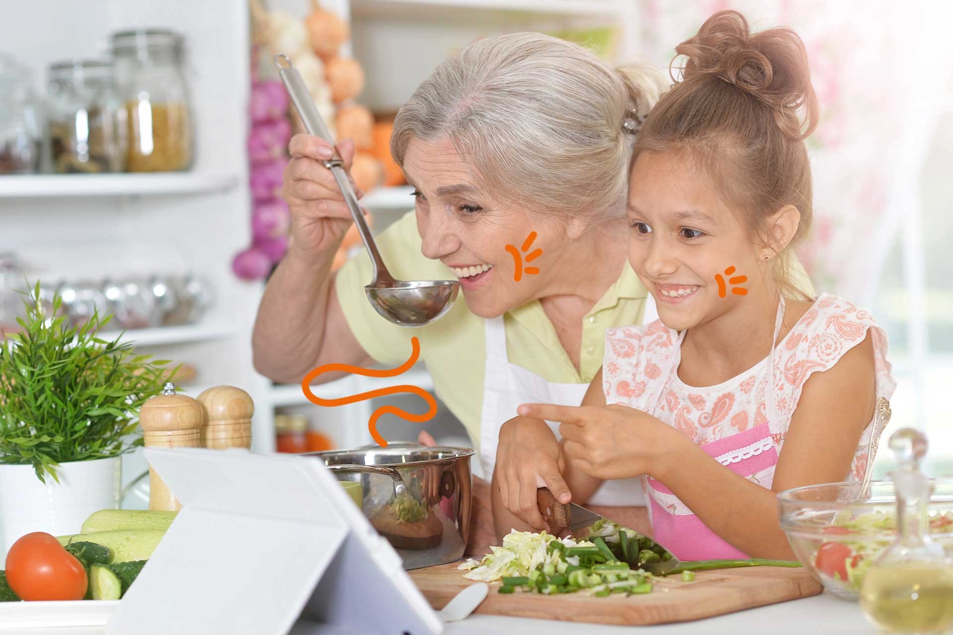 senior avec enfant goute repas
