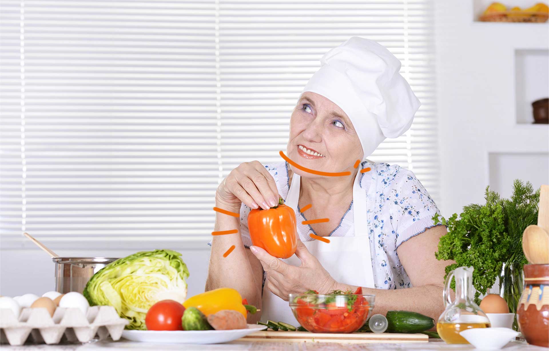 senior préparant un repas en cuisine