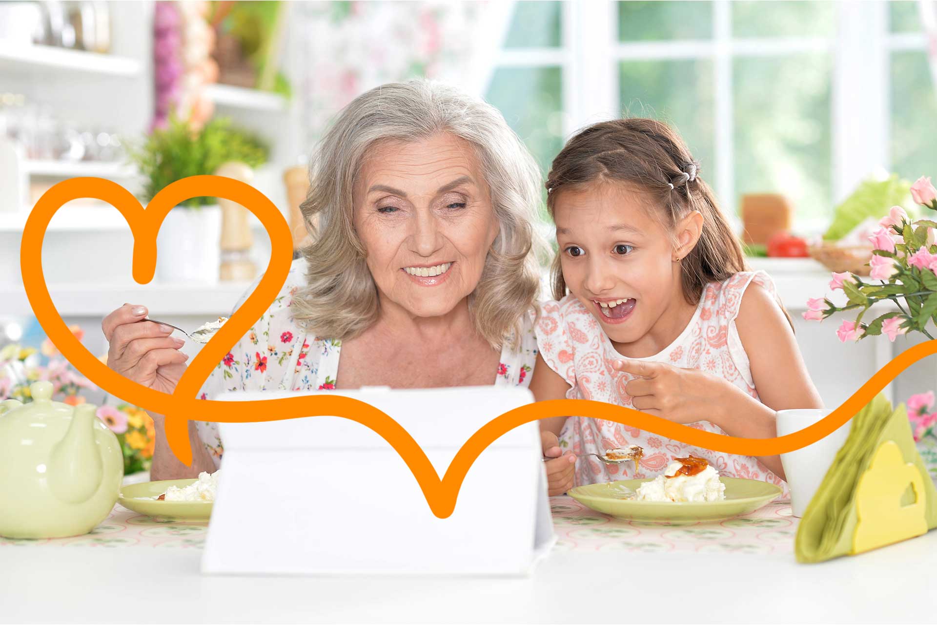 personne âgée qui partage un repas devant une tablette